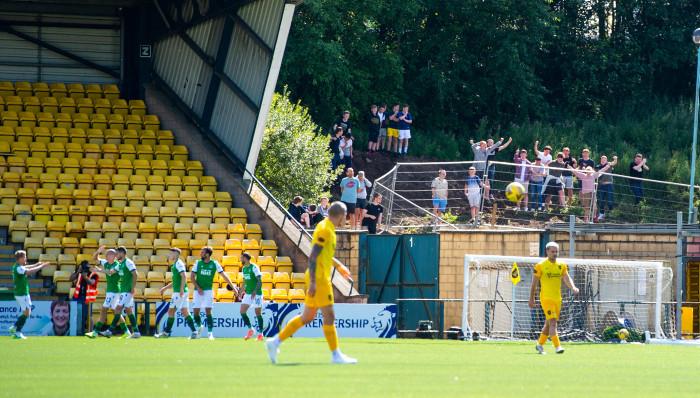 Fans have been going to extremes to see their team this season - some have gathered at high vantage points despite social distancing rules, like here at Livingston.  Others even hired cherry-pickers to watch games at other stadia during the lockdown.
(Ross MacDonald / SNS Group)