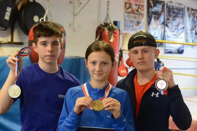 North Star Boxing Club champions from left Riley Gunn, 12, Layla Straughan 13 and Oliver Potts, 13.