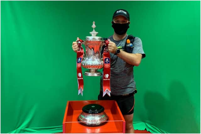 Nathan Richardson lifting the FA Cup at Arsenal.