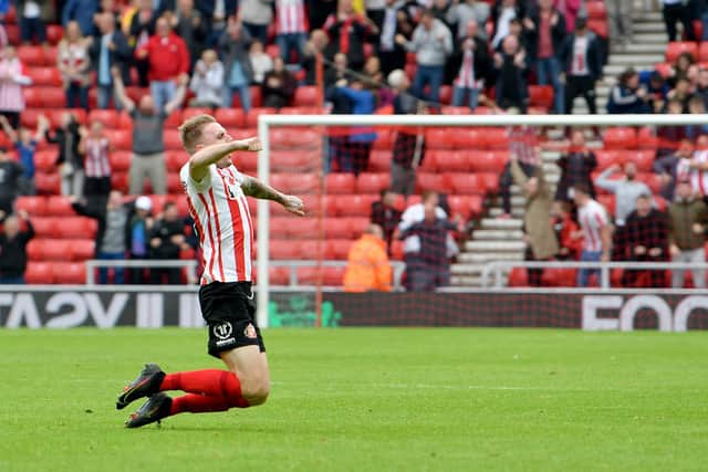 Carl Winchester celebrates a Sunderland goal.