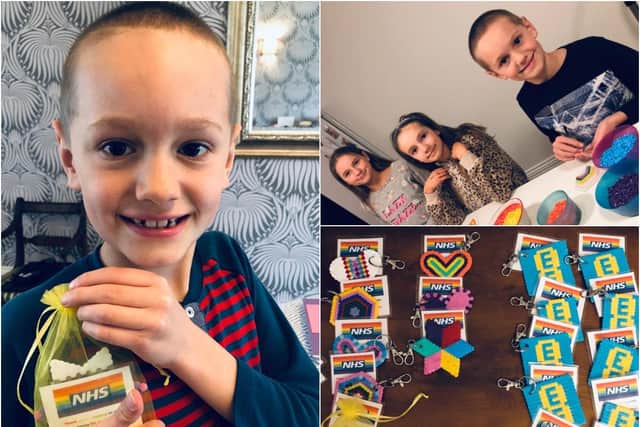 Henry Wood, 8, has made dozens of key-rings to raise money for the NHS Charities Together.
