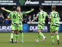 Forest Green Rovers' Connor Wickham celebrates with his team-mates after scoring their side's second goal of the game during the Emirates FA Cup first round match at the 1st Cloud Arena, South Shields. Picture date: Saturday November 5, 2022.