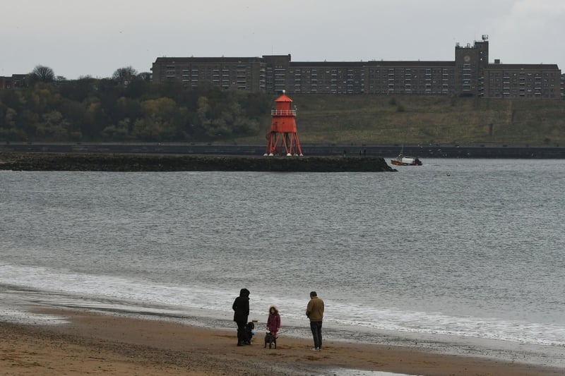 Family on the beach at South Shields on Monday.