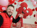 Red Sky Foundation's Sergio Petrucci with the heart wall at The Bridge's Sunderland.