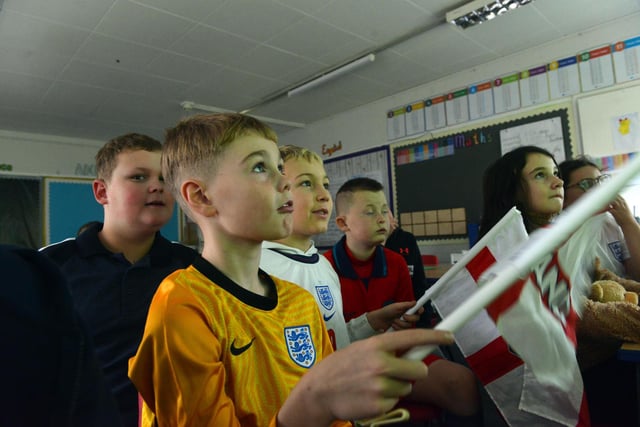 Tension in the air as Plains Farm Academy pupils watch the start of England's first World Cup game against Iran.