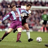 11 Dec 1999:  Alan Thompson of Aston Villa battles with Brian Atkinson of Darlington during the FA Cup third round match at Villa Park in Birmingham, England. Villa won 2-1. \ Mandatory Credit: Gary Prior /Allsport