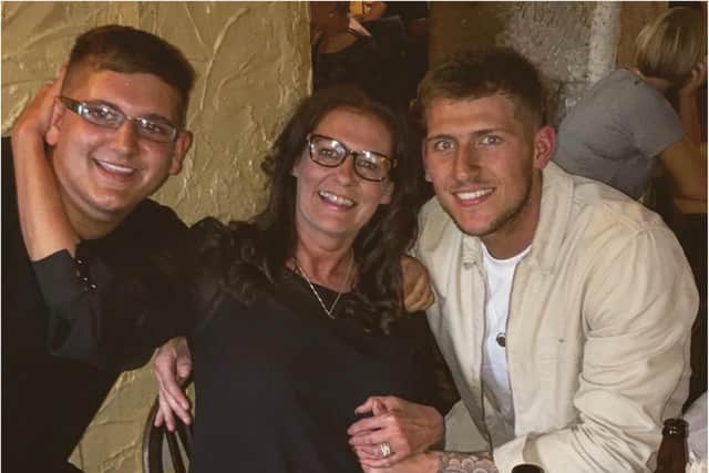 James (right) with mum Lynne Wright and brother Grant Wright.
