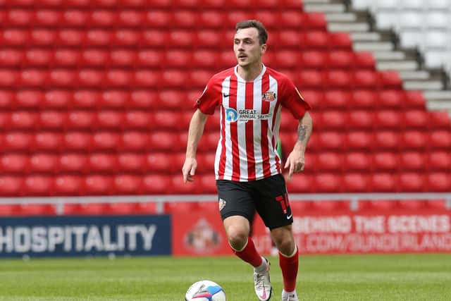 SUNDERLAND, ENGLAND - MAY 09: Josh Scowen of Sunderland in action during the Sky Bet League One match between Sunderland and Northampton Town at Stadium of Light on May 09, 2021 in Sunderland, England. (Photo by Pete Norton/Getty Images)