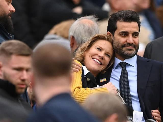 Newcastle United co-owners Amanda Staveley and husband Mehrdad Ghodoussi embrace as their Wedding anniversary is displayed on the big screen during the Premier League match between Newcastle United and Aston Villa at St. James Park on October 29, 2022 in Newcastle upon Tyne, England. (Photo by Stu Forster/Getty Images)