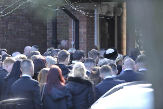 Mourners attending David Doran's funeral service held at Sunderland Crematorium.