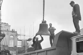 The bell being lowered from the clock tower of the old Town Hall in Fawcett Street in 1971.