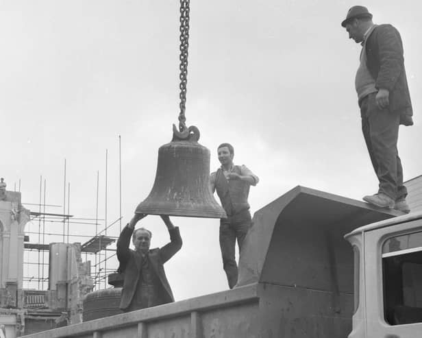 The bell being lowered from the clock tower of the old Town Hall in Fawcett Street in 1971.