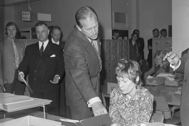 The Duke of Edinburgh paused to have a word with Mrs Beatrice Lewis, an acting supervisor at the Employmnent Exchange in Borough Road, during his visit in May 1972.
