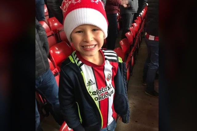Charlie celebrating his fifth birthday at his first ever game.