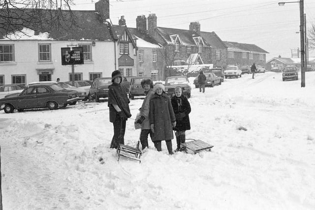 These children were having fun with sledges in Penshaw in 1979.
