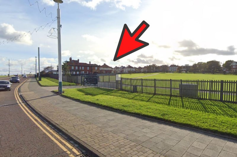 After turning left, head towards the entrance of the recreation ground and cut through.