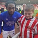 Jack Berry with Luton Town FC player Fred Onyedinma.