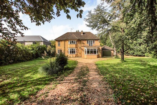 This property in Glinton comes with three reception rooms, a modern kitchen, four bedrooms, a double garage, stables and an overall plot of 1.98 acres. Available for offers over £775,000.