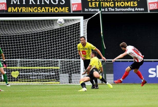 Elliot Embleton scores his and Sunderland's second goal behind closed doors at Harrogate.