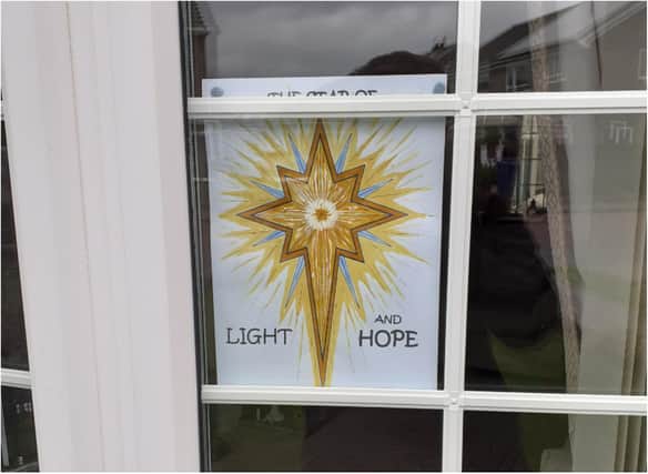 The church are asking the community to shed 'light and hope' during a difficult time.