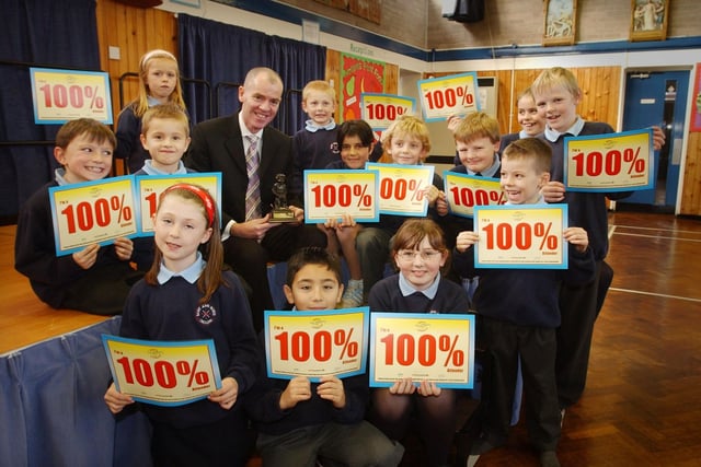 All of these pupils had a 100 per cent school attendance record 18 years ago. Have you spotted someone you know?