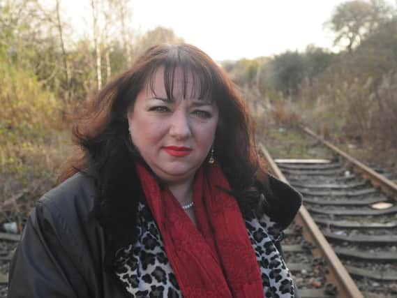 Sharon Hodgson inspects the abandoned Leamside Line