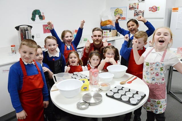 Sunderland AFC goalkeeper Lee Burge posed for a photograph before baking cakes with children during the EFL Day of Action held at the Beacon of Light in 2020.