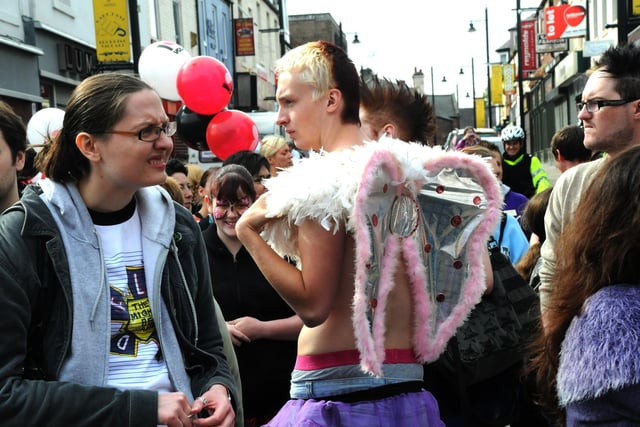 Carnival atmosphere as the Pride Festival parade arrives in Park Lane.