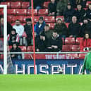 Anthony Patterson makes a save from Iliman N'Diaye