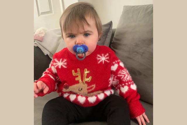 Freya, age 11 months, celebrating her first Christmas.