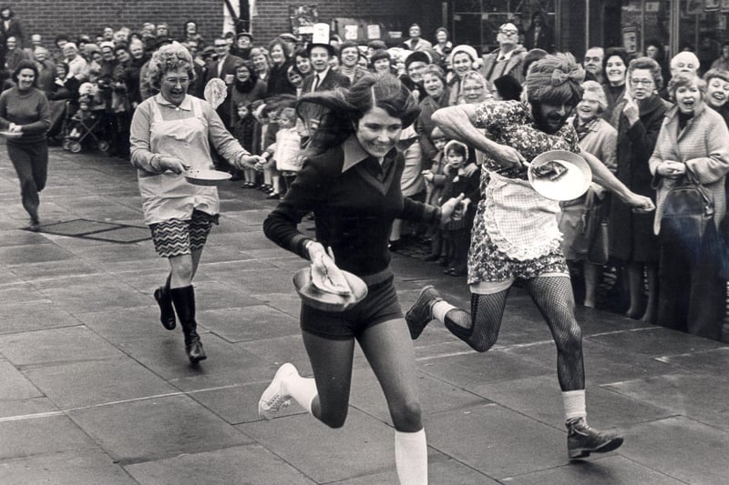 Competitors in the Woodhouse pancake race, February 1975