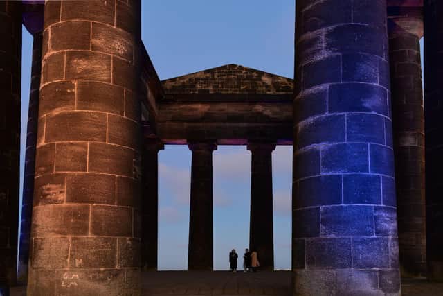 Penshaw Monument lit in the national colours of Ukraine.