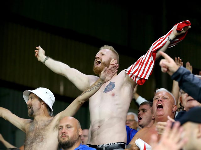 Sunderland fans celebrate during the Carabao Cup Second Round match between Burnley and Sunderland at Turf Moor on August 28, 2019.