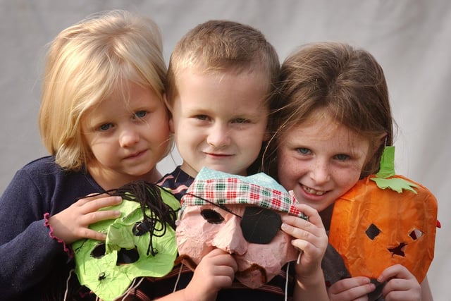 Making masks at the Lovegrove Centre in 2003 but who are the children having a great time?