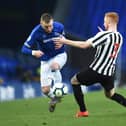LIVERPOOL, ENGLAND - MAY 08:  Josh Bowler of Everton and Liam Gibson of Newcastle United in action during the Premier League Cup Final match between Everton and Newcastle United at Goodison Park on May 08, 2019 in Liverpool, England. (Photo by Nathan Stirk/Getty Images)
