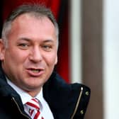 Stewart Donald's decision to sign Will Grigg has been defended