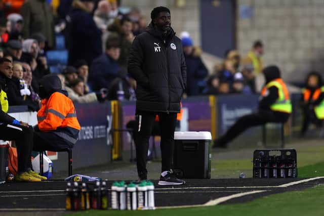 LONDON, ENGLAND - DECEMBER 10: Kolo Toure, Manager of Wigan Athletic, looks on during the Sky Bet Championship match between Millwall and Wigan Athletic at The Den on December 10, 2022 in London, England. (Photo by Andrew Redington/Getty Images)