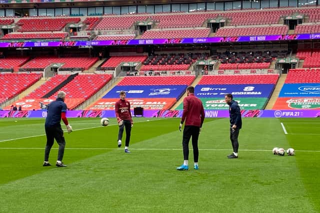 The Sunderland players warm up at Wembley.