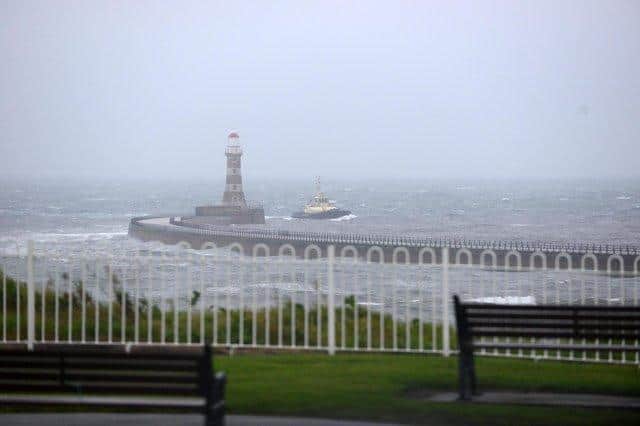 File pictures: Heavy rain fall and strong winds at Roker.