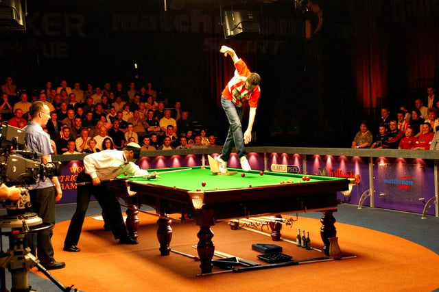 Snooker's World Trickshot Championship was held at Crowtree Leisure Centre in 2003. Martin Potts was pictured helping one of the players with his shot.