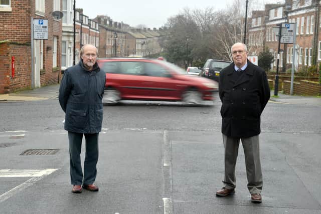 From left councillors Peter Wood and Michael Dixon at the junction of The Cloisters and Tunstall Vale where there has been a number of accidents.