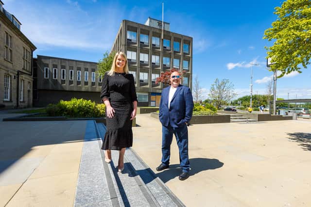 Laura Lloyd, investment and development manager for Hanro and Coun Graeme Miller at the site of the former Gilbridge Police Station.