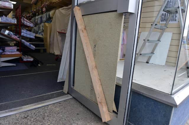 The door was kicked in by thieves.