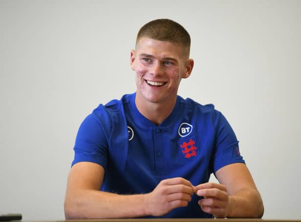 BURTON-UPON-TRENT, ENGLAND - MAY 31: Charlie Cresswell of England U21s is interviewed during the England U21 Men Media Activity at St Georges Park on May 31, 2022 in Burton-upon-Trent, England. (Photo by Nathan Stirk/Getty Images)