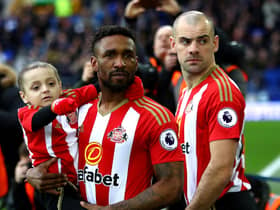 LIVERPOOL, ENGLAND - FEBRUARY 25:  Bradley Lowery (L) is carried out by Jermain Defoe of Sunderland (R) prior to the Premier League match between Everton and Sunderland at Goodison Park on February 25, 2017 in Liverpool, England.  (Photo by Clive Brunskill/Getty Images)