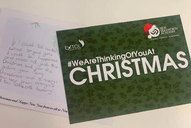 Children have been writing their own unique messages on the back of the cards to give out to the local community.