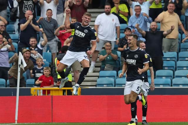 Charlie Cresswell celebrates after scoring a goal for Millwall against Stoke City. (Photo by Henry Browne/Getty Images)