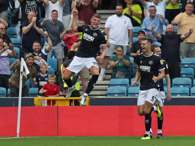 Charlie Cresswell celebrates after scoring a goal for Millwall against Stoke City. (Photo by Henry Browne/Getty Images)