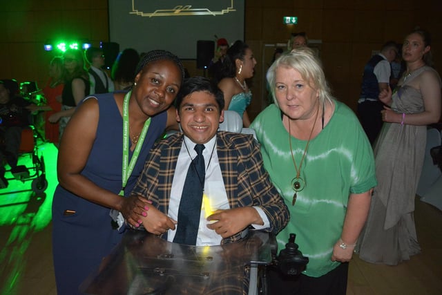 Year 14 student Hassan Mohammed with teaching assistants Ana Mateus and Angela Archer.