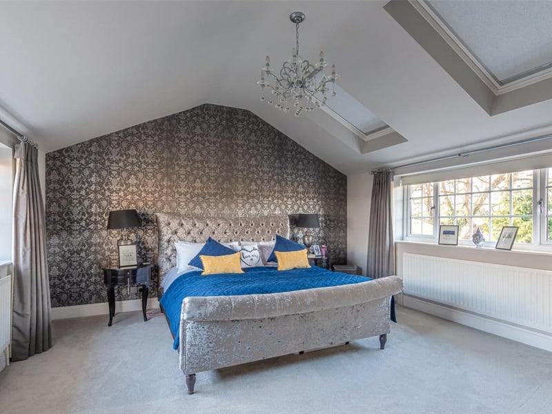 There are four bedrooms in total, including a master suite which benefits from its own en-suite shower room and an impressive dressing room.